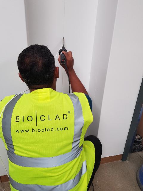 An Elite BioClad Installer fitting a wall