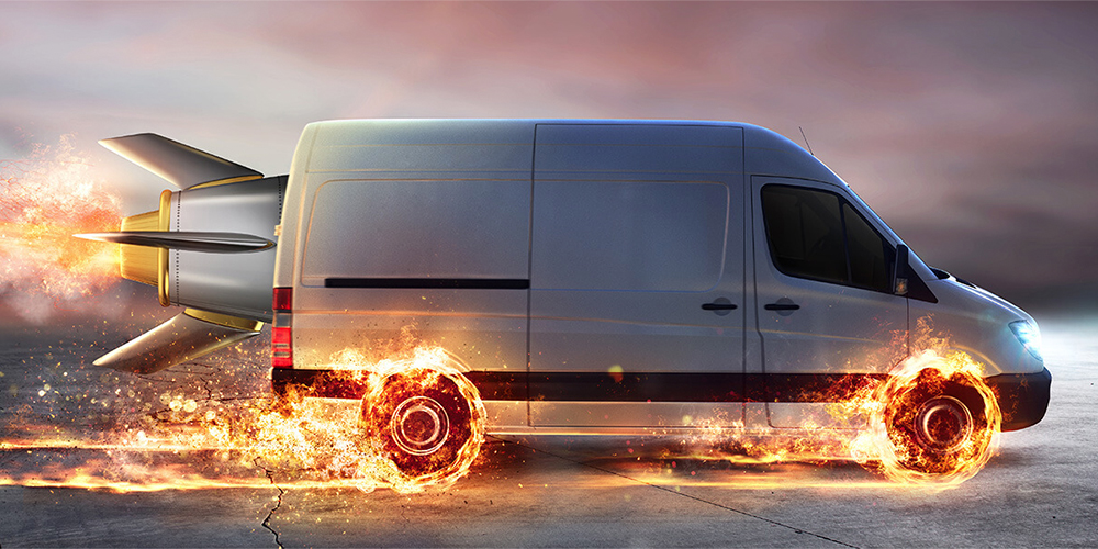 Delivery van with wheels on fire