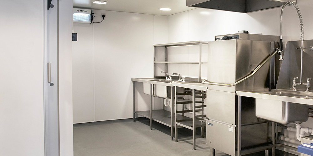 A kitchen with BioClad hygienic wall cladding